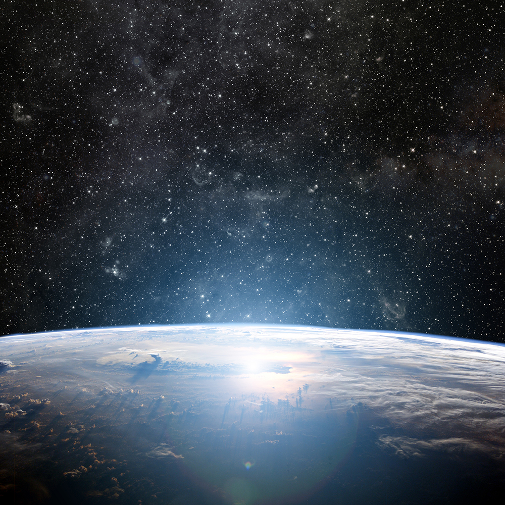 Satellite image of Earth's horizon with stars